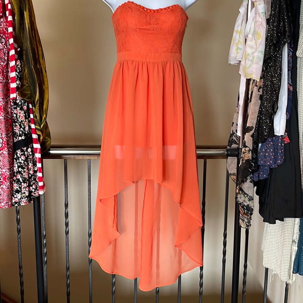 Beautiful orange high low dress.
